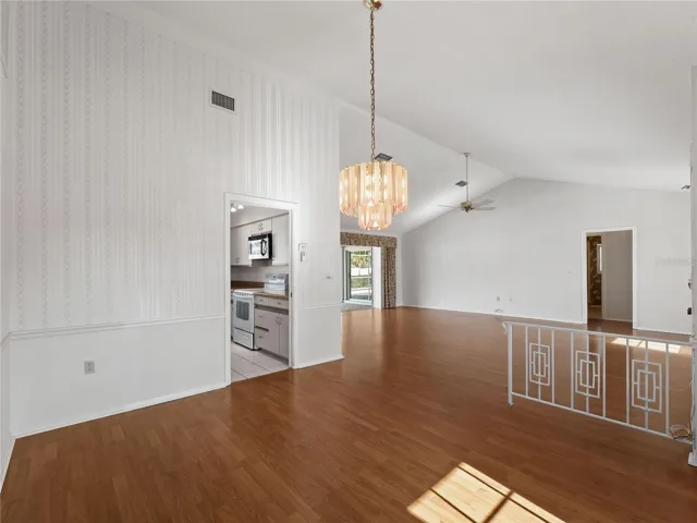 Dining room with great room in the background.