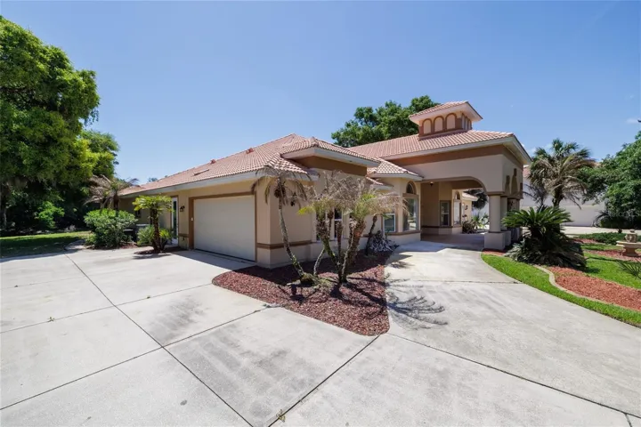 Attached garage and a multi-car paved driveway