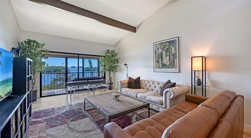 Two bedroom 2 bath condo with vaulted ceilings.