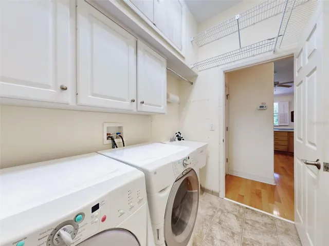 Laundry room into hall off kitchen