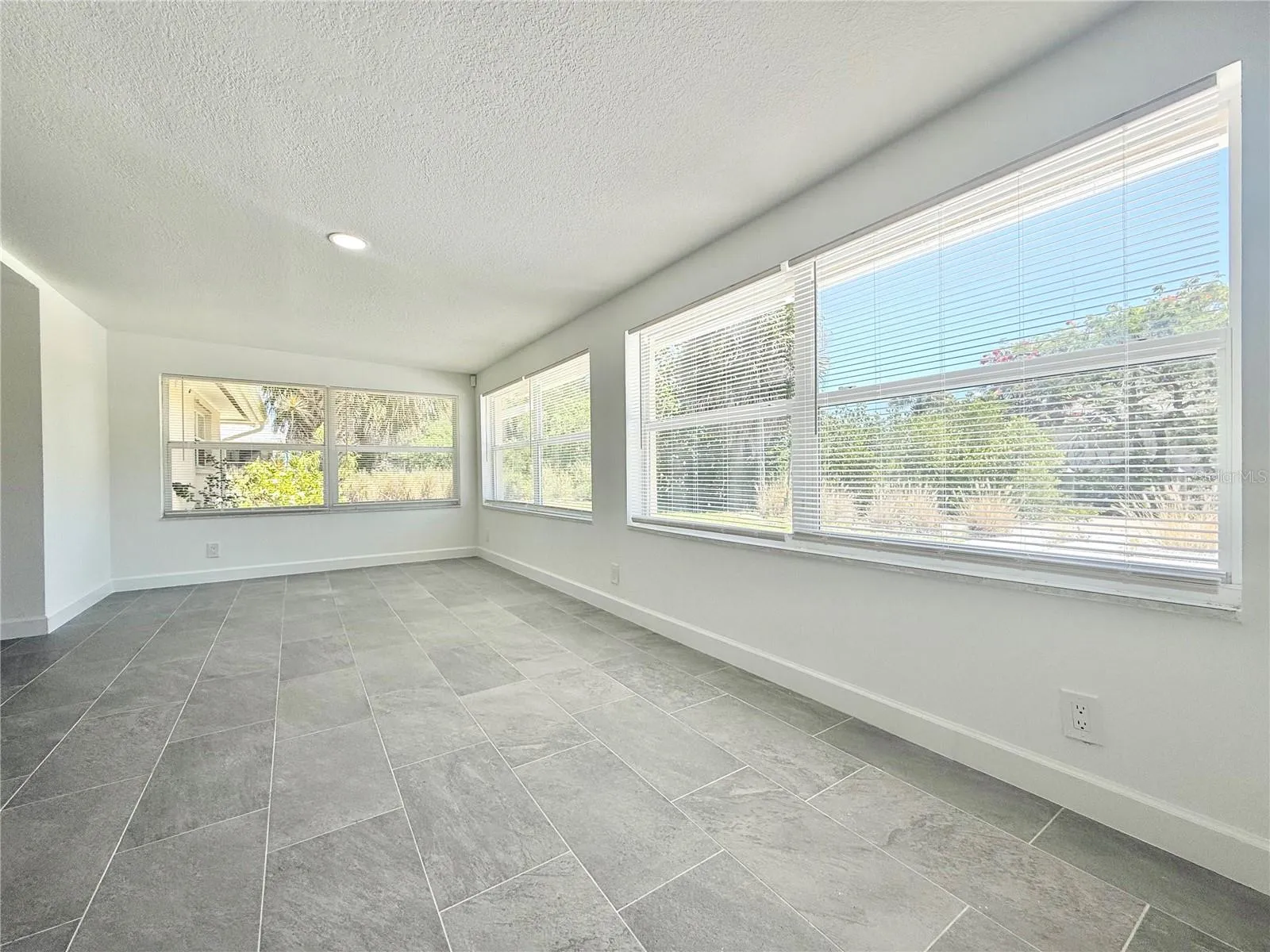 Florida Room off of Living Room with Water Views