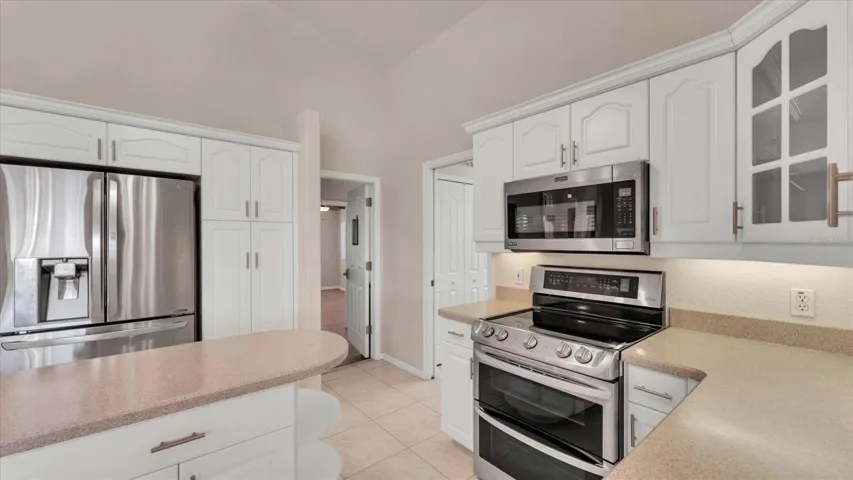 This welcoming kitchen is a natural gathering place for family and friends.