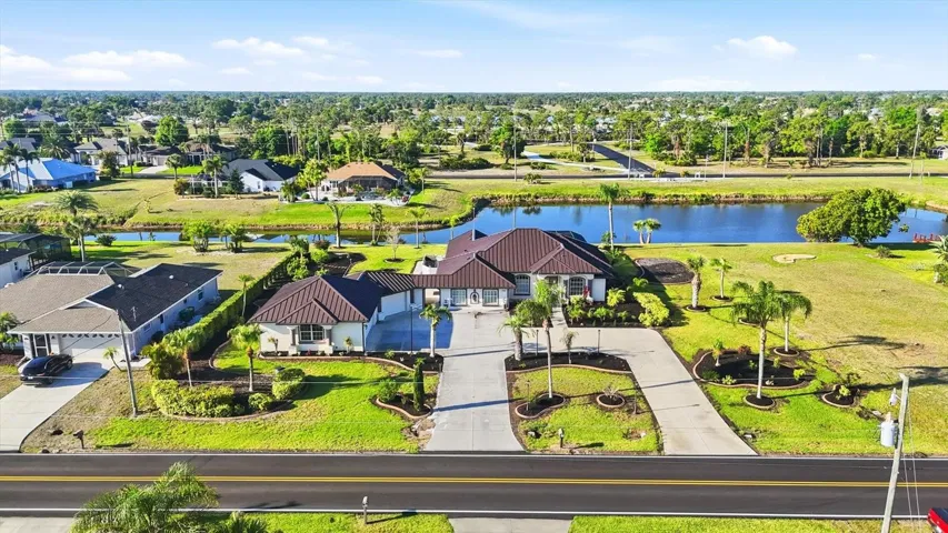 This stately home offers abundant curb appeal, a double estate lot in an x-flood zone, and an 1125 SQ FT GARAGE.