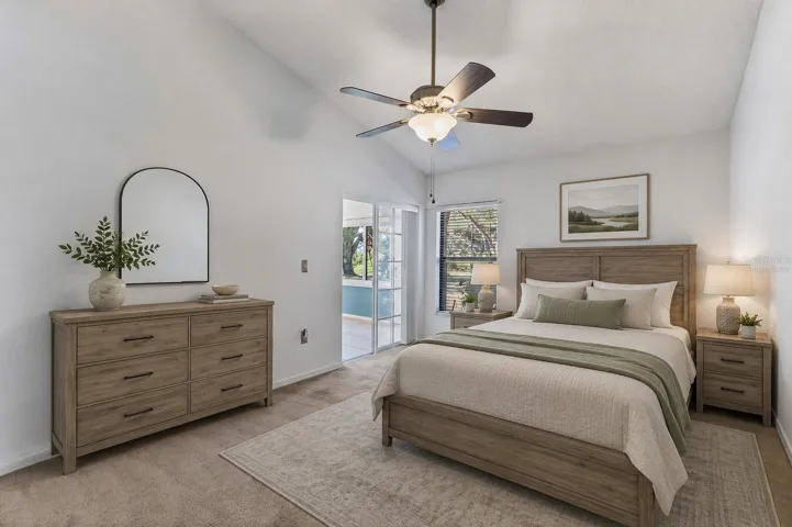 Virtually staged guest bedroom has vaulted ceiling