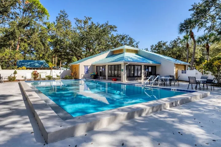 Pool and clubhouse before the new roof was put on