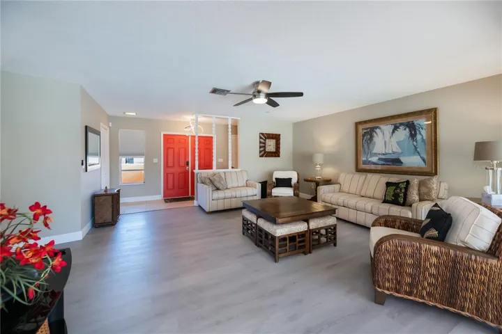 Spacious Formal Living Room showing Front Entry of Home