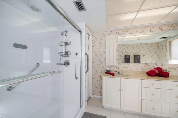 Walk in Glass Shower Door with Double Sink Vanity in On Suite Bathroom