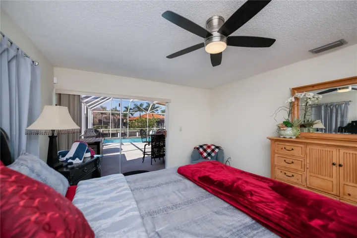 Primary Bedroom with On Suite Bathroom and Pool Access