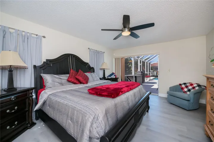 Primary Bedroom with On Suite Bathroom and Pool Access