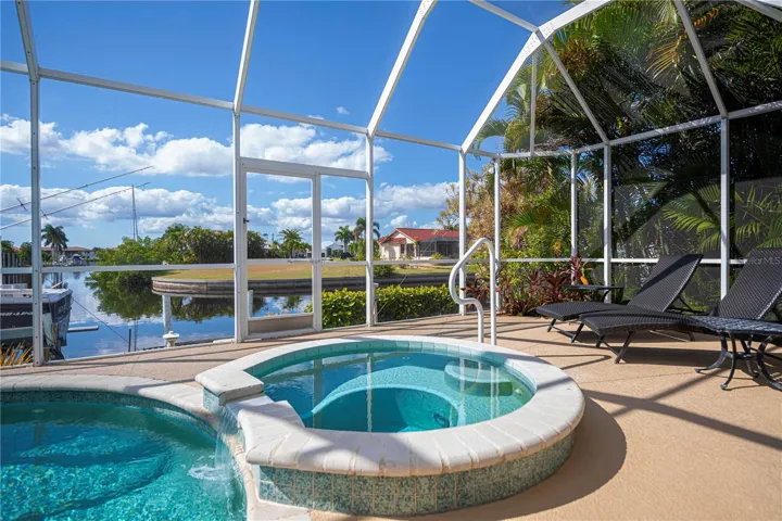 In Ground Heated Pool plus Spa with Screened In Enclosure