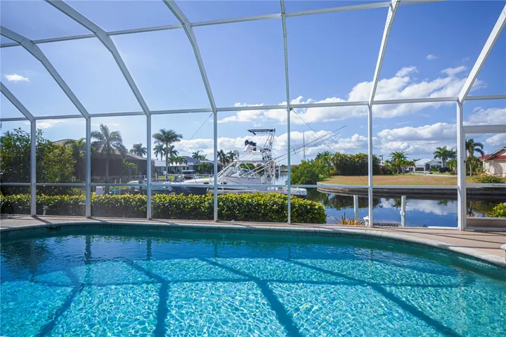 In Ground Heated Pool plus Spa with Screened In Enclosure