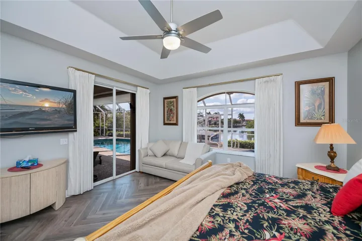 Primary Bedroom with Amazing Water Views, Lanai Access, Two Walk In Closets and On Suite Bathroom