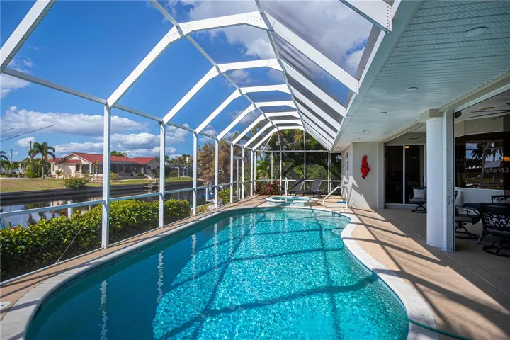 In Ground Heated Pool plus Spa with Screened In Enclosure