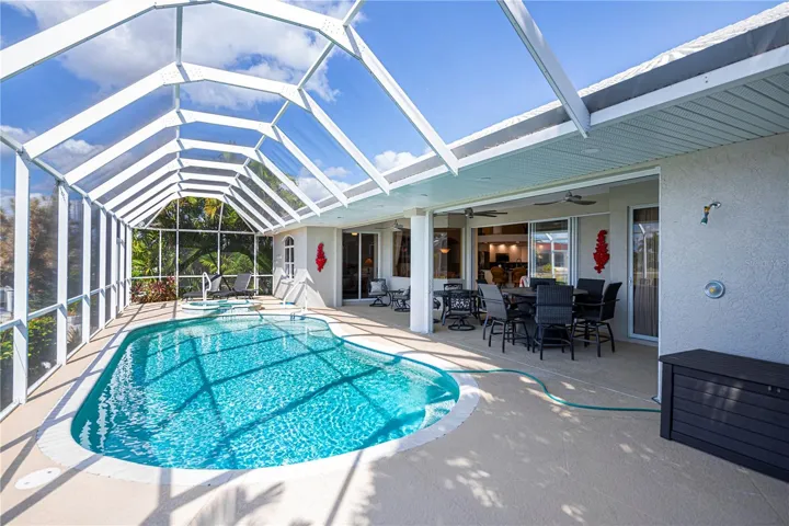 In Ground Heated Pool plus Spa with Screened In Enclosure