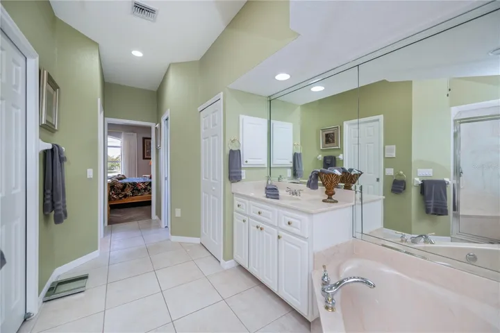 Primary on Suite Bathroom with Two Vanity, Soaking Tub and Walk in Shower