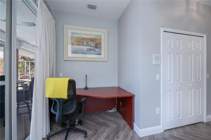 Guest Bedroom 4 with Built in Desk, Closet and Access to Pool Area