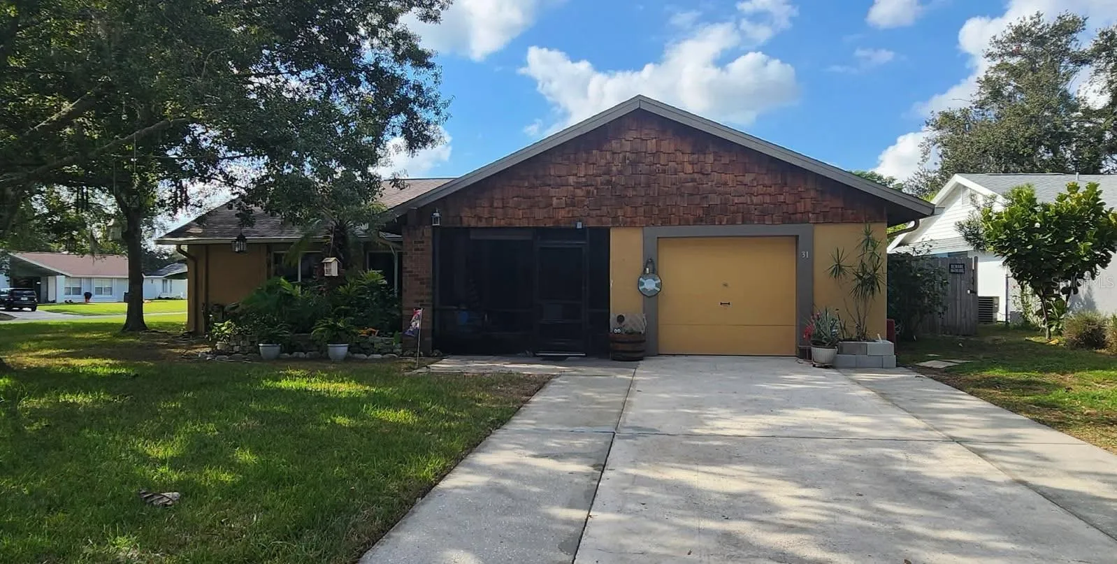 31 Chip Ct. 3 bedroom 2 bath home with 2 large screen porches and fenced back yard.  Home is located on a corner lot.