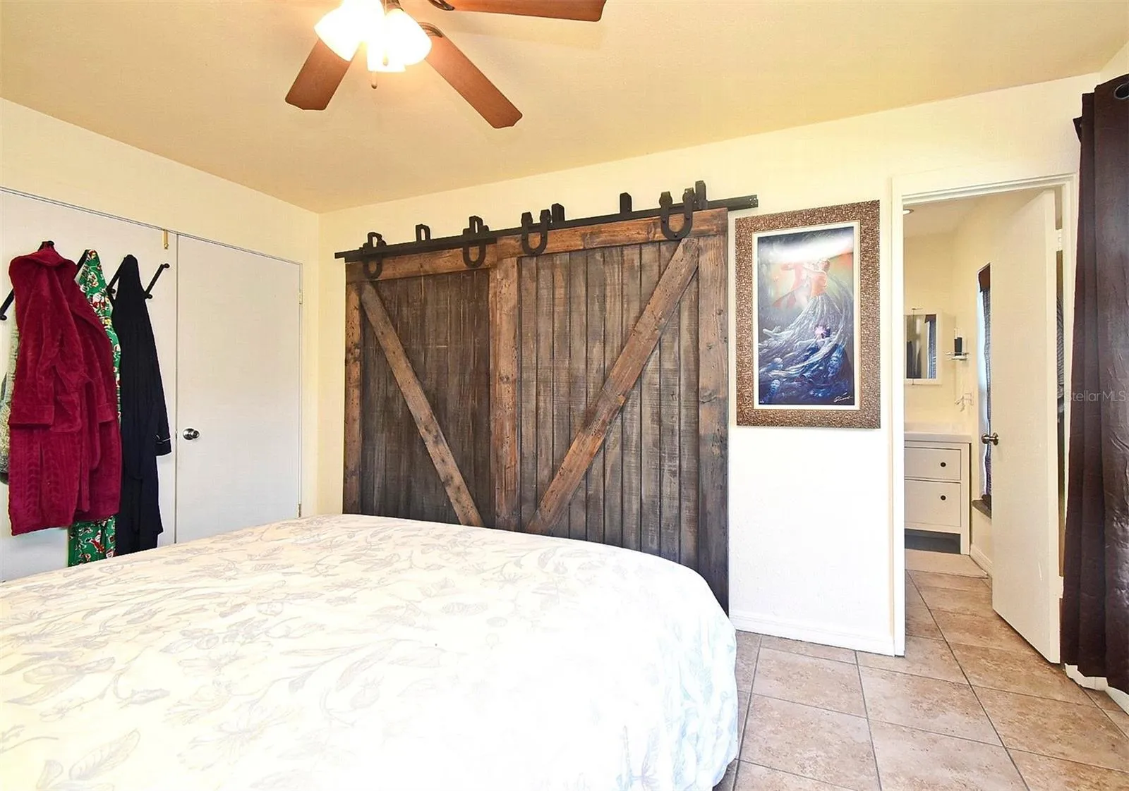 Primary bedroom with furniture