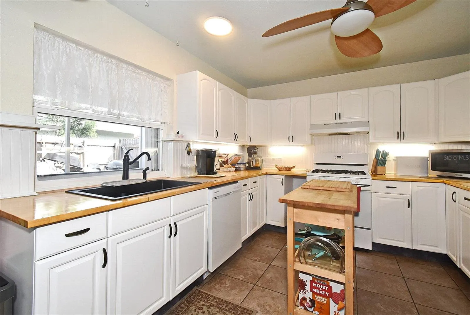 31 Chip Ct. This kitchen features a deep sink overlooking the entertainment area.