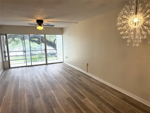Living room faces the north (so no direct sun). Great for enjoying breakfast or dinner on the patio, looking through the trees!