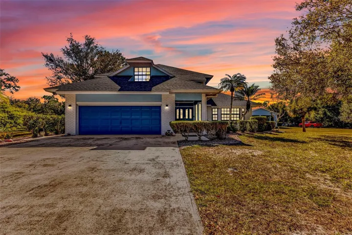 Dusk front shot- porch on side