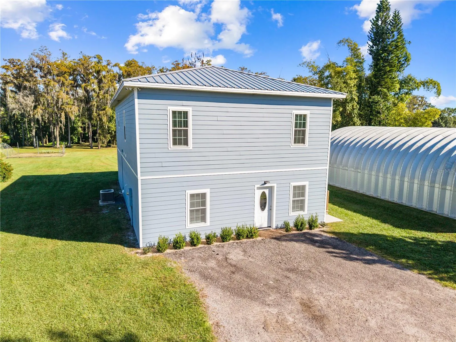 Side view of front with 30 x 50 Metal building.