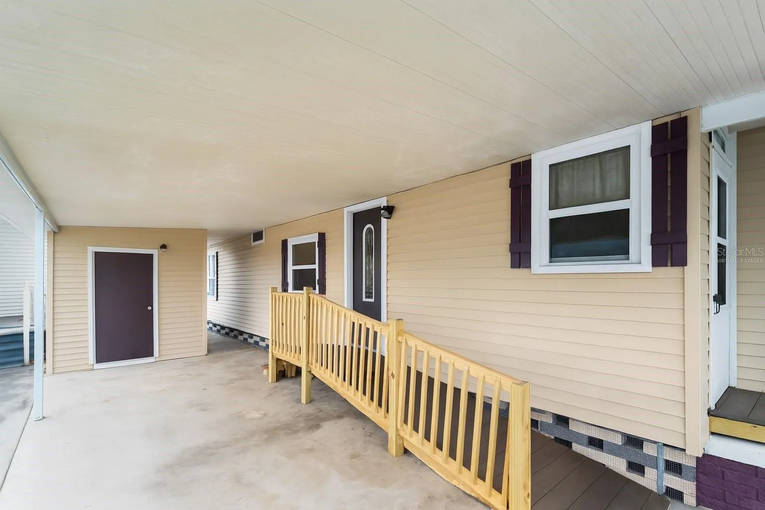 (Virtually Staged) CoveredPatio_154RarotongaRd_NorthPort_Shade.jpg