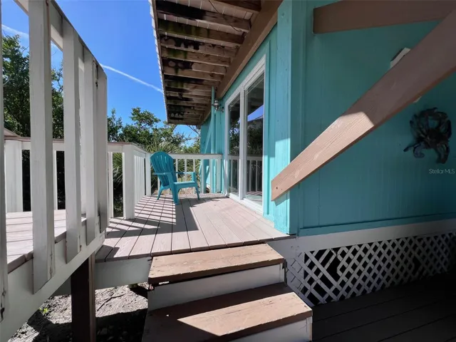 Stairs leading to the downstairs bonus bedroom and bath