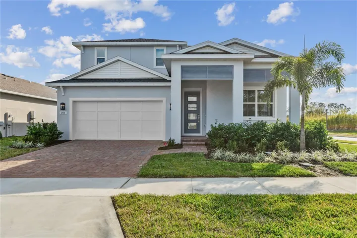 Light-filled coastal exterior with effortless seaside charm and curb appeal.