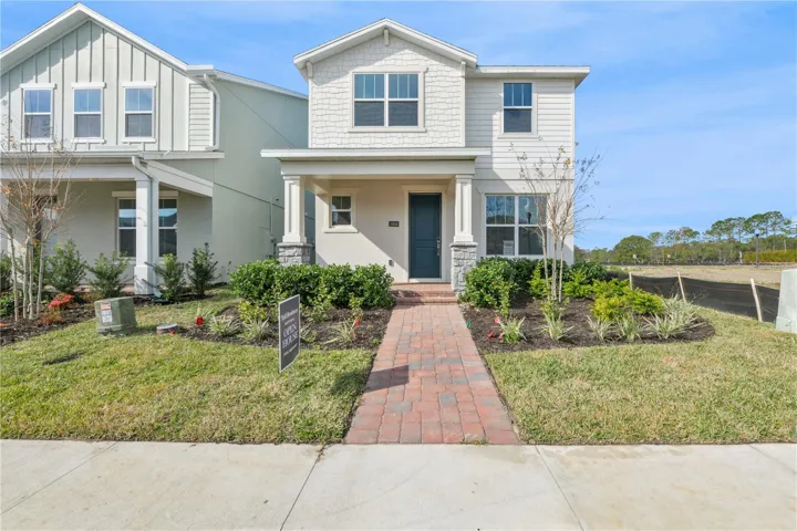 Charming Craftsman exterior with artisan wood and stone details and welcoming curb appeal.