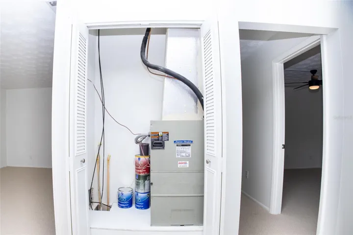 AC Closet with Extra Storage Space