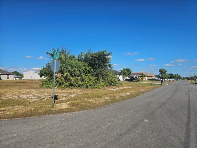Lot has access from both sides, established homes nearby.