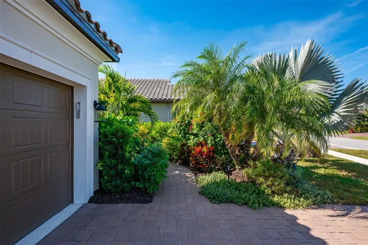 Lush landscape as you enter home.