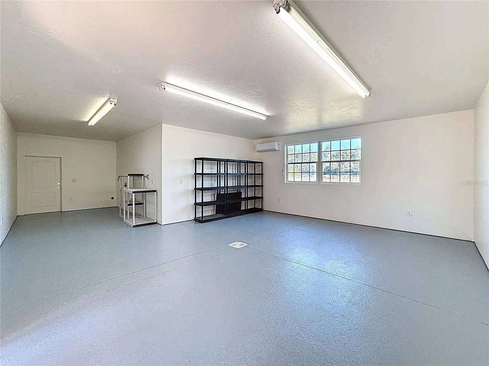 Large Room newly refurbished and garage floor sealant added
