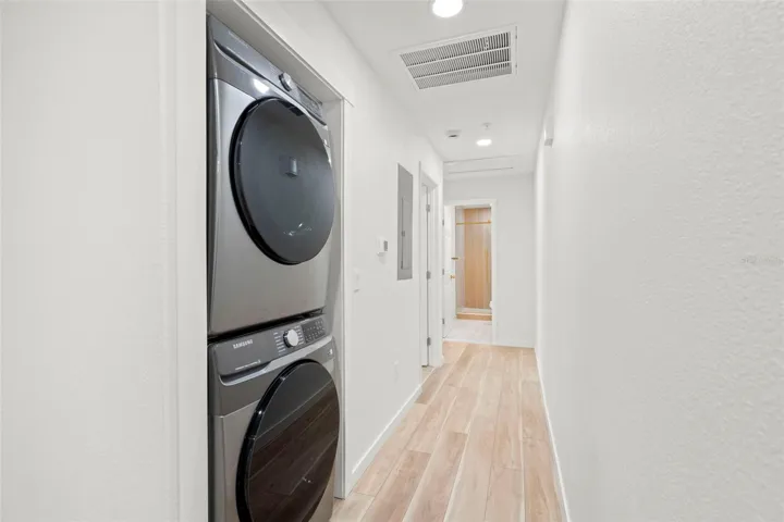 Laundry Hallway Leading to Beds & Baths