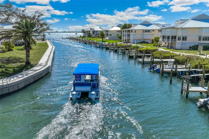 The Island Passage II heading to Little Gasparilla Island - Private Beach Access for Placida Harbour Club owners & guests