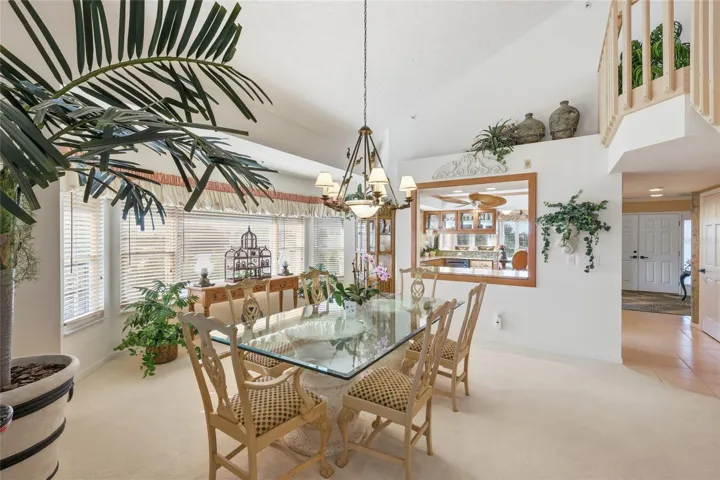 Formal Dining Room with service window to Kitchen.