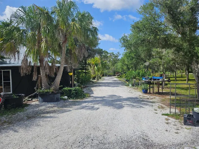 Drive goes around the perimeter of the property.