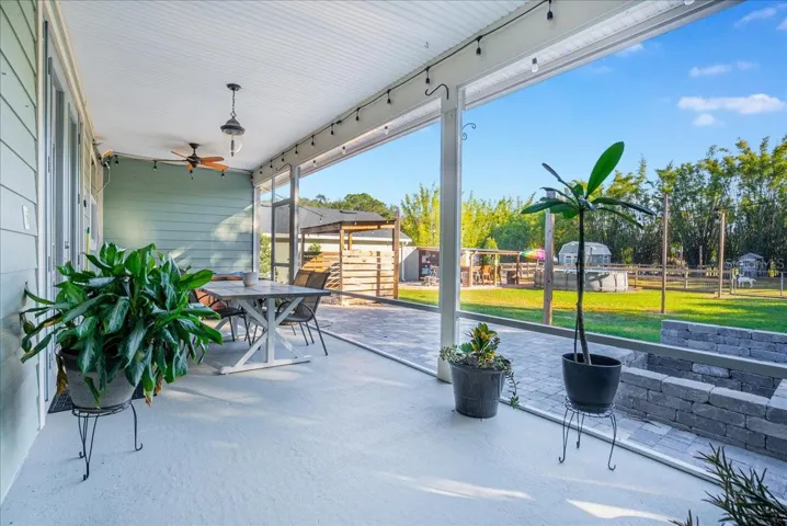 Screened Back Porch with Paved Fire Pit