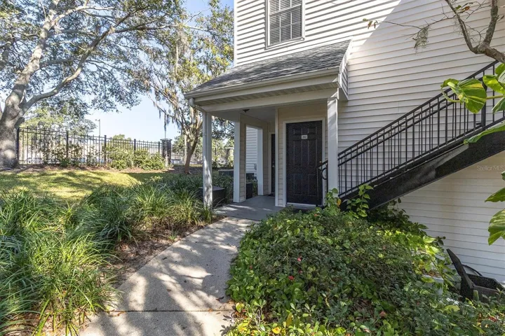 Private walkway with beautiful landscaping to your door