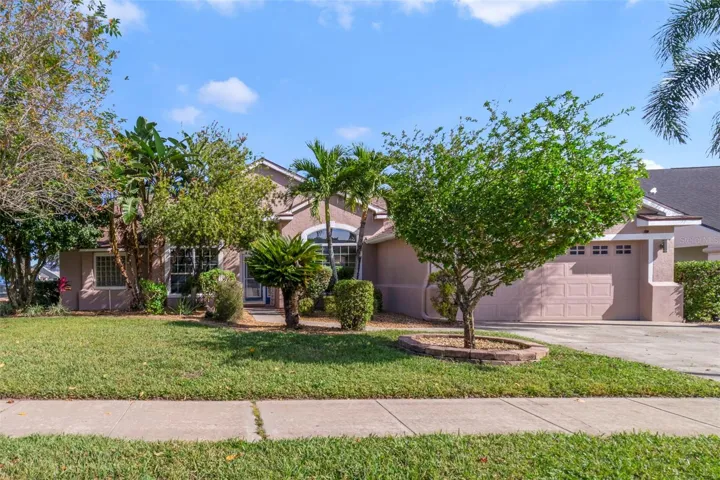 Welcome to this beautifully maintained 4-bedroom, 3-full bath, single-story POOL HOME in the heart of Hunter’s Creek, offering you the sought-after combination of comfort, flexibility, and Florida living!