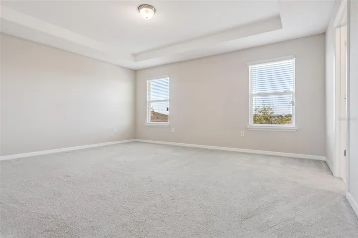 2 windows in primary bedroom