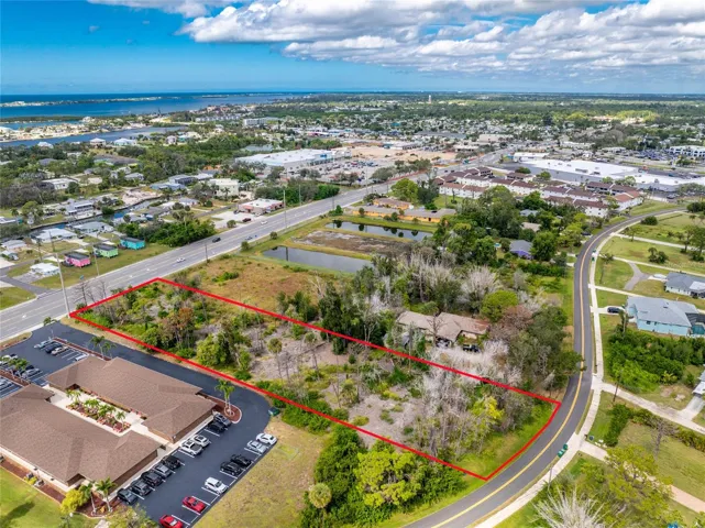 1.51 acre OMI site on Placida Road with strong daily traffic.