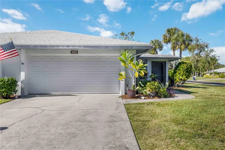 2 car garage. Villa is located on a corner lot
