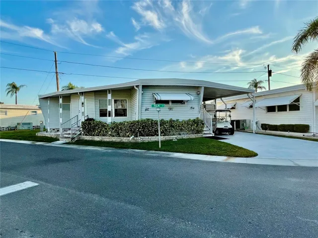 Corner unit across from the Clubhouse and pool, great location! Newer roof 2024