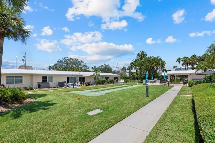 Through the center of the property you will find 2 sidewalks that lead you to your private portion of Siesta Key beach.