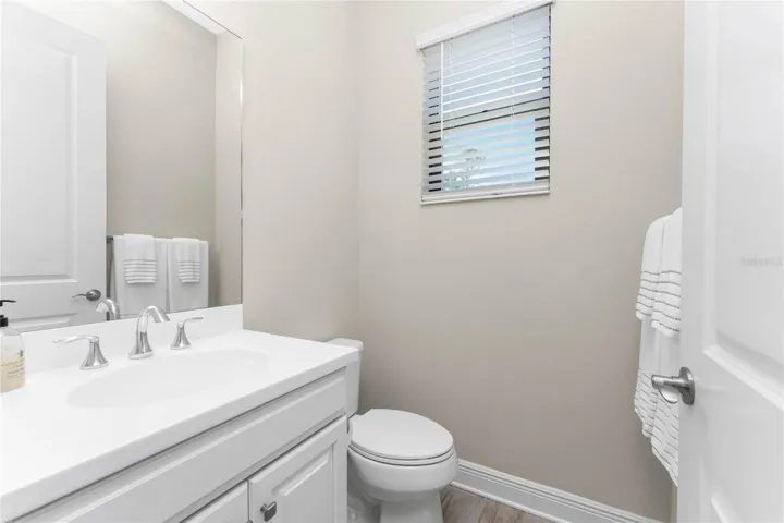Half Bath w/ Access to Lanai