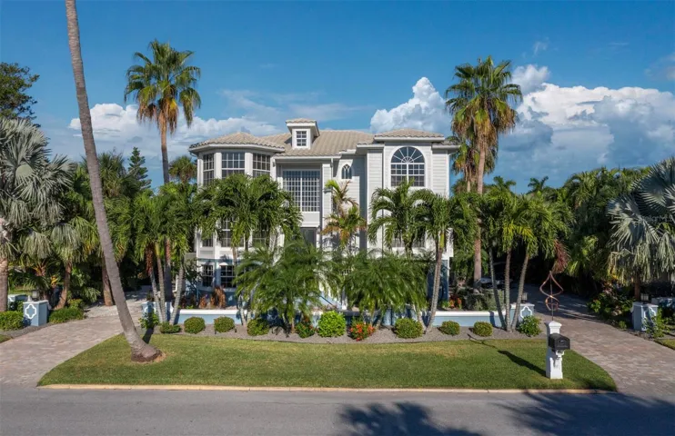 This majestic home allows for an amazing lifestyle in the heart of the Village on Longboat Key.
