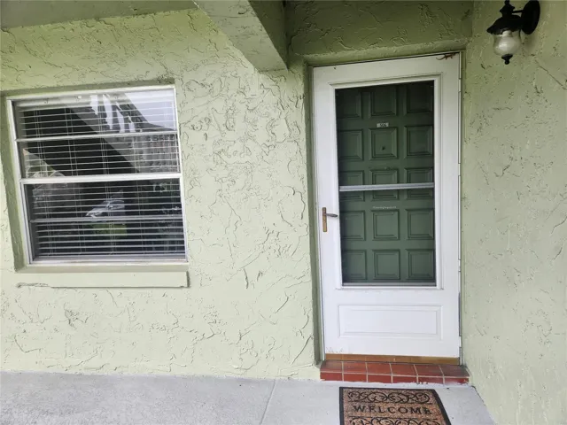 Furnished 1st floor end unit with reserved parking in front