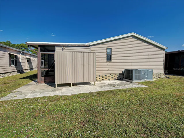 REAR ENTRY TO ATTACHED SHED AND LANAI